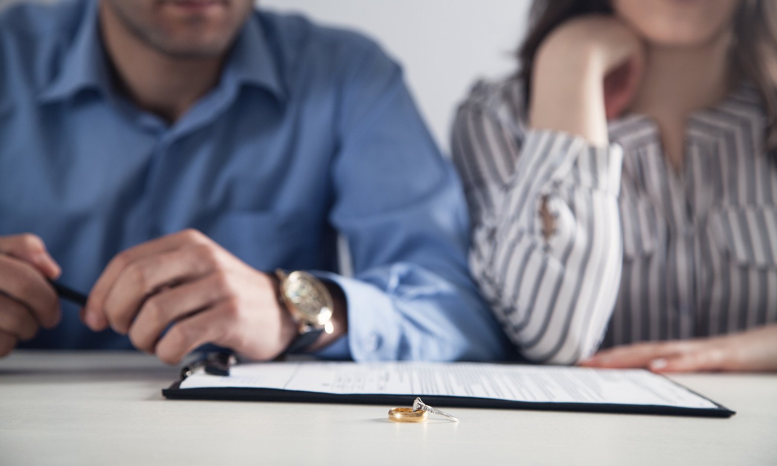 Colorado couple reviewing options for dividing family home during divorce.