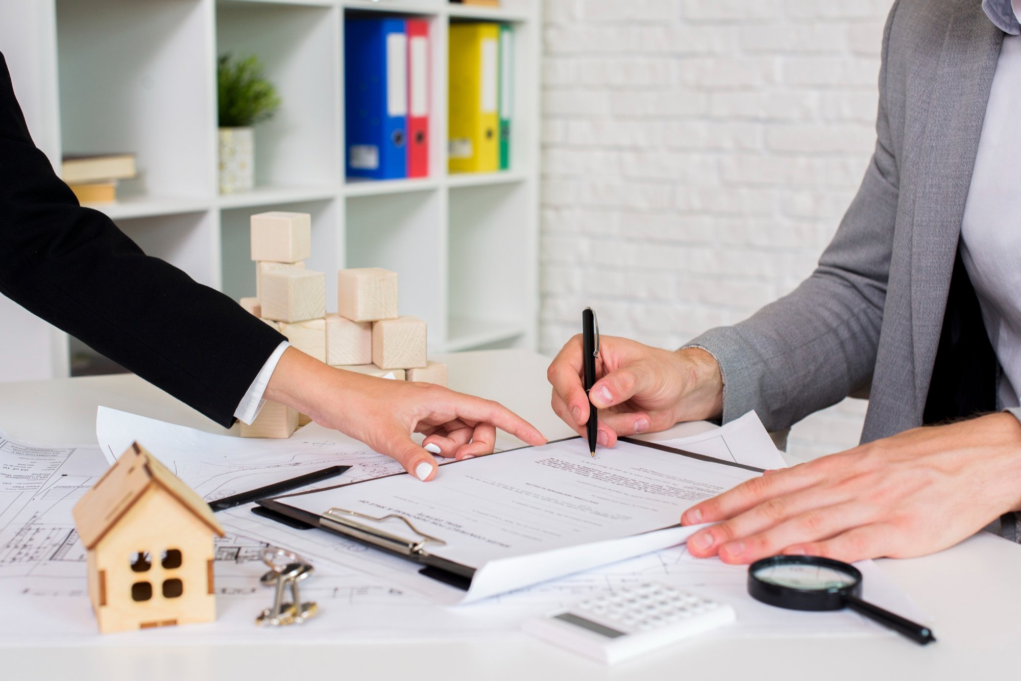 Woman suggesting changes in a colorado marital agreement